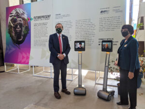 CoLaborators guiding museum guests through telepresence robots in Future Present exhibition.