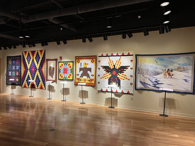 Indigenous quilts from the MSU Museum on display at the Ziibiwing Center in Mt. Pleasant.