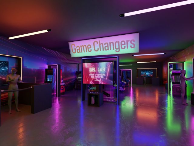 A futuristic, neon-lit gaming exhibition titled "Game Changers" features various interactive displays and arcade stations. The room is illuminated with vibrant purple, blue, and green lights, creating a cyberpunk-inspired atmosphere. A central screen labeled "GEL LAB: Games of Learning and Education" stands prominently, surrounded by classic and modern gaming setups. Mannequin-like figures are positioned throughout the space, engaging with VR experiences, arcade machines, and video game consoles. The reflective floor enhances the glowing ambiance, making the space feel immersive and high-tech.